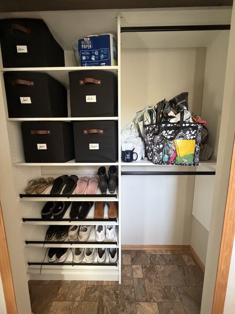 Custom reach-in closet by TrueForm Closets