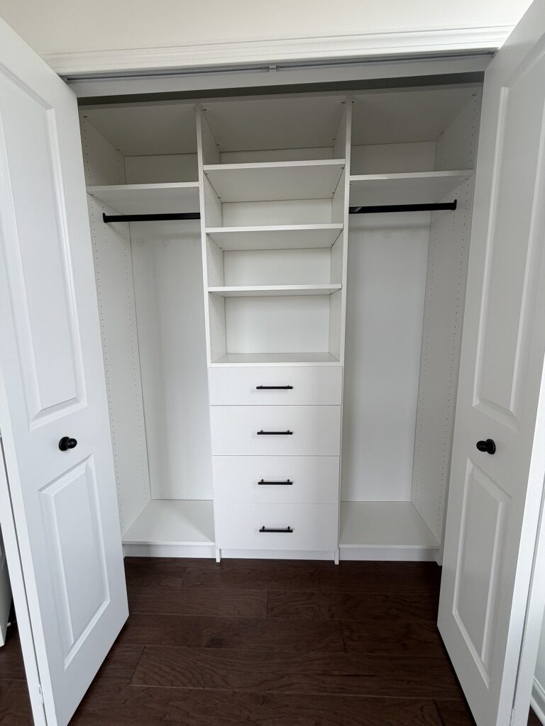 Custom reach-in closet by TrueForm Closets