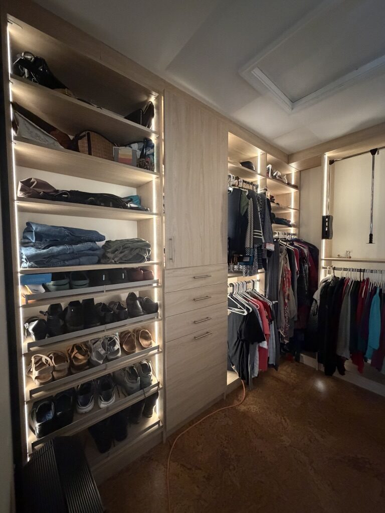 Custom walk-in closet by TrueForm Closets