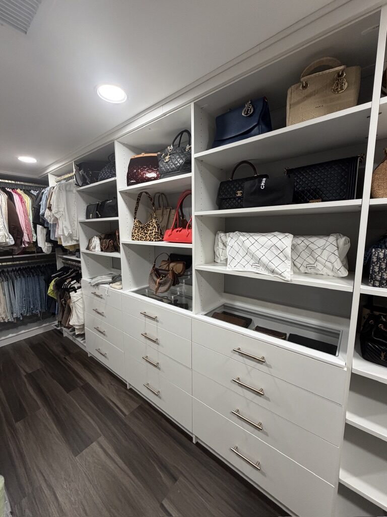Custom walk-in closet by TrueForm Closets
